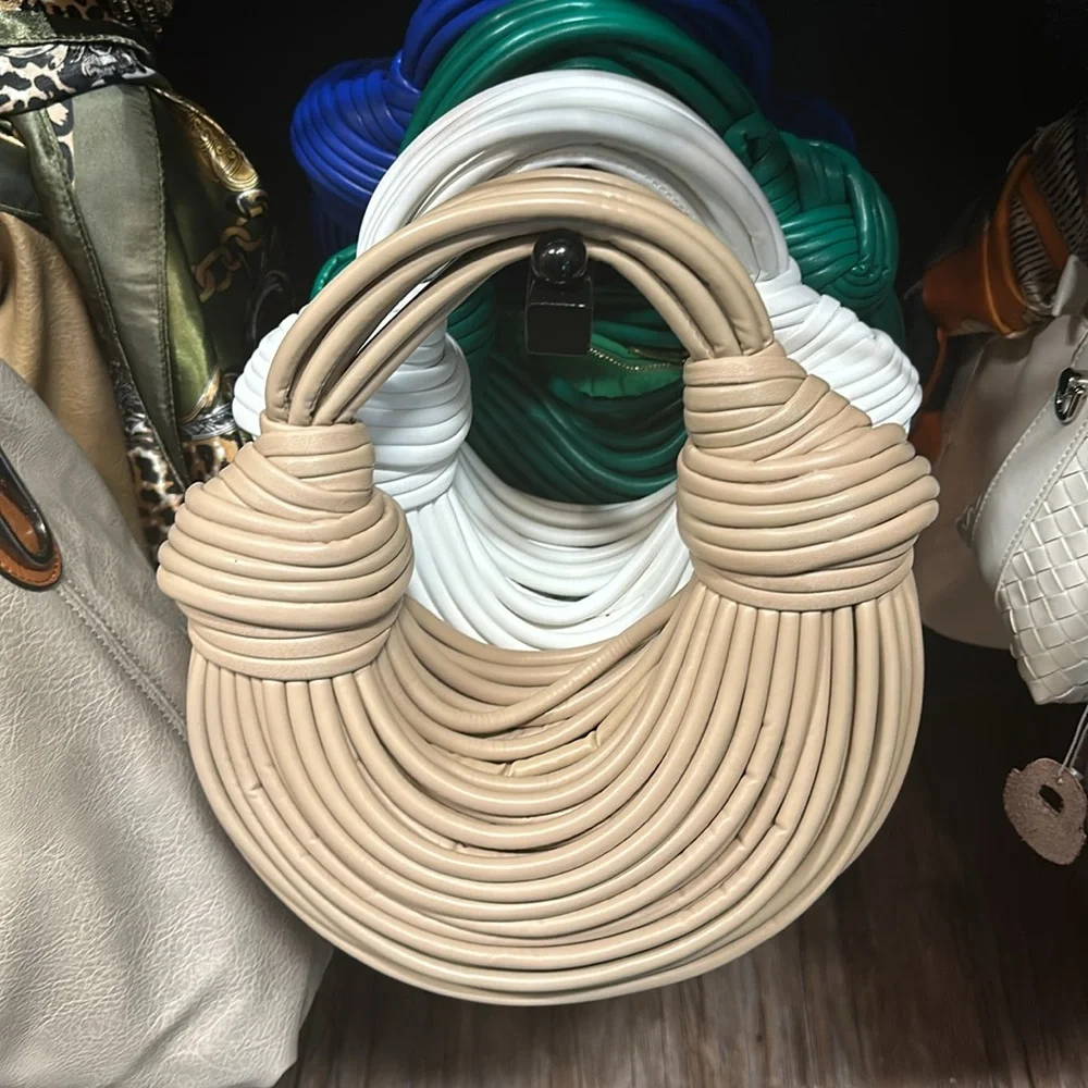 A rope purse holds very few items example phone lipstick keys handheld purse - Picture 6 of 10